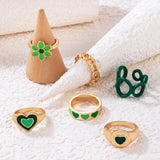 6-Piece Gold-Plated Alloy Ring Set with Green Daisy Accents