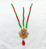 Elegant Golden Matha Patti with Green & Red Stones – Majestic