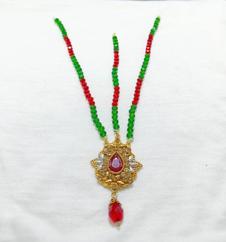 Elegant Golden Matha Patti with Green & Red Stones – Majestic