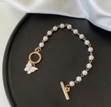Gold-Plated Pearl Thread Bracelet — Elegant White Thread Bracelet