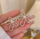 Silver-Plated Off-White Alloy Earrings — The Embellishers