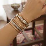 12-Piece Modern Silver & Gold-Plated Slim Bangle Set